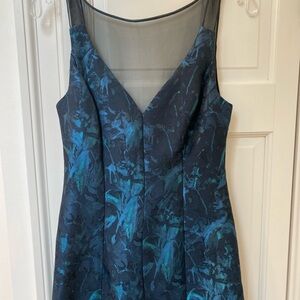 BLACK TIE: Elegant Blue Sleeveless Dress with Netted Coverage and Train